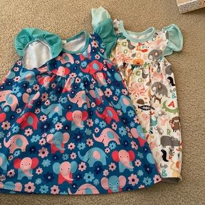 2 like new dresses 2t